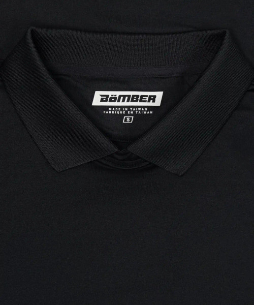 Legacy T-Polo, black flat-knit collar with moisture-managing performance fabric, close-up view
