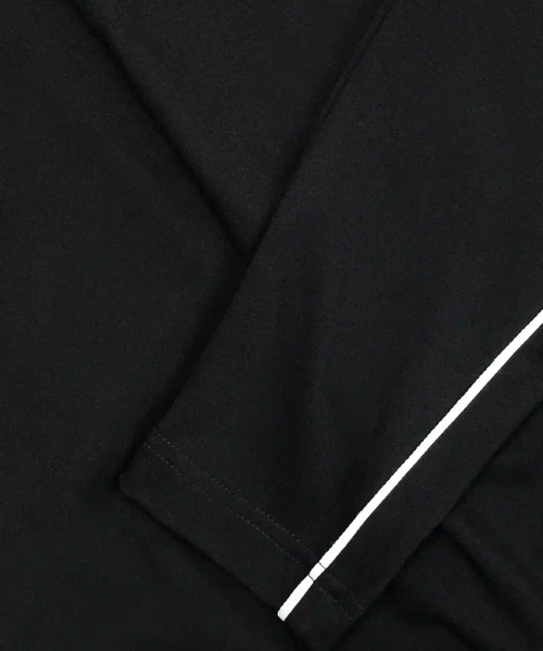 Pinnacle DR Q-Zip, black stretch nylon performance pullover with taped sleeve detail, close-up view