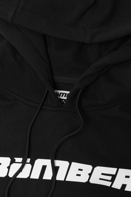 Prime Hoodie, black LuxeGo brushed performance fabric, close-up view