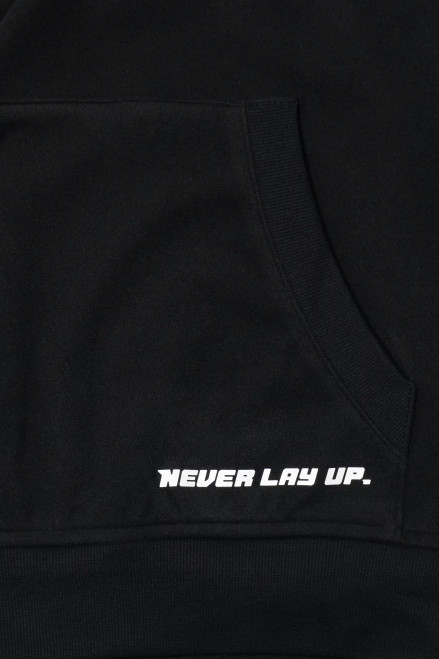 Prime Hoodie, black LuxeGo brushed hoodie with Bomber chest logo, close-up view