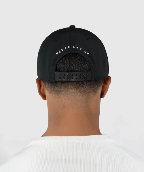 Ambition Snapback, black snapback with adjustable double snapback closure worn by model, rear lifestyle view
