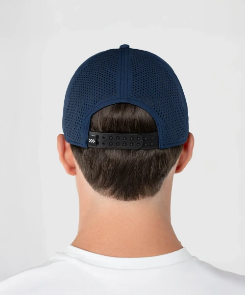 Impact Snapback, navy snapback with breathable Apex mesh back panels worn by model, rear lifestyle view