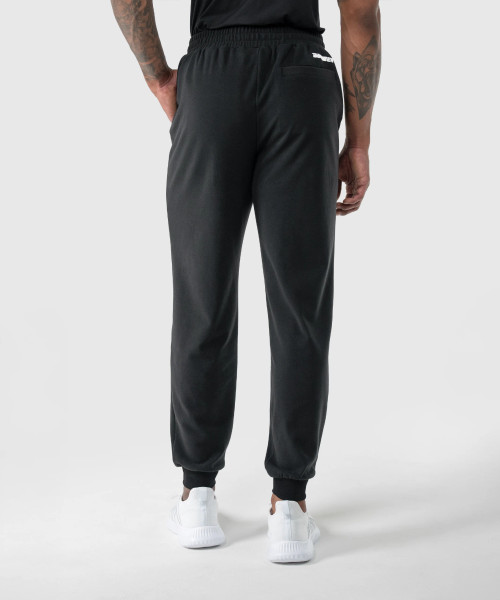 Prime Jogger, men's black brushed fleece jogger with rib cuffs and back pocket, back view