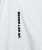 Drive T-Shirt, white performance t-shirt with silicone Bomber back yoke logo, close-up view