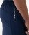Focus Active Short, men's navy athletic shorts with deep hand pocket and heat transfer logo, close-up view