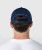 Method Snapback, navy snapback with adjustable double snapback closure worn by model, rear lifestyle view