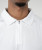 Peak Polo, white performance polo collar and button placket, quick-dry fabric detail