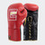 Photo of a pair of Combat Corner's red Punchers Professional Fight Gloves, which are Mexican Boxing Gloves that are hand made in Thailand. Photo of a pair of Combat Corner's red Punchers Professional Fight Gloves, which are Mexican Boxing Gloves that are hand made in Thailand.