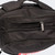Top down closeup detail product photo of the deluxe shoulder straps on the black Combat Corner Vital 30 Training Backpack