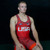 Wrestler Kneeling in Red Singlet