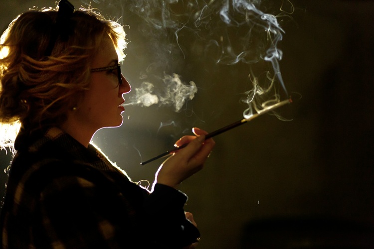 what percentage of the population smoke cigarettes Share of adults who smoke or use tobacco