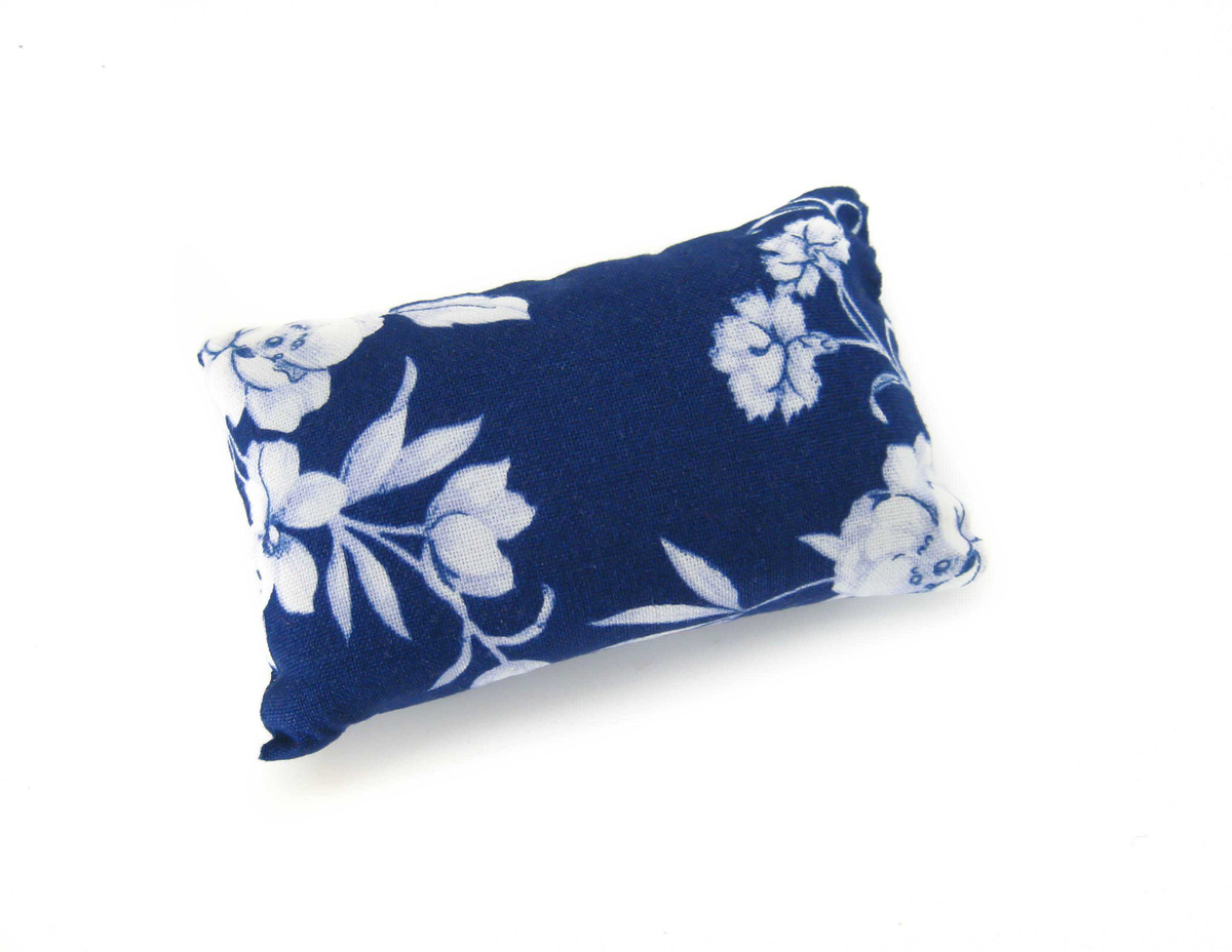 Emery Sand Filled Sewing Pin cushion with white flowers on royal blue fabric