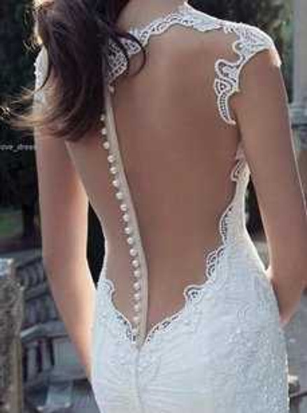 Plastic White Pearl Buttons on the back of a wedding dress