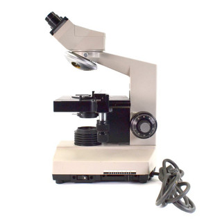 Compound laboratory microscope seen from the side