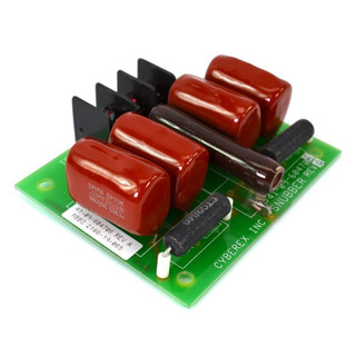 Green circuit board with red capacitors