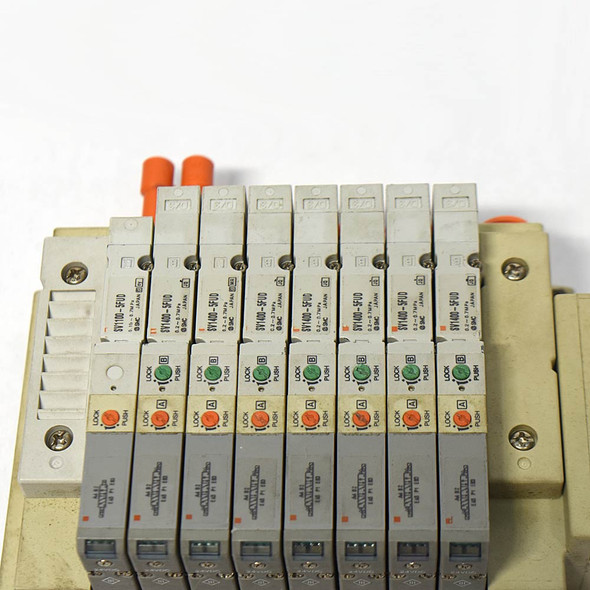 SMC Pneumatics (7) SV1400-5FUD (1) SV1100-5FUD Solenoid Valves w/ Valve Manifold SMC Pneumatics (7) SV1400-5FUD (1) SV1100-5FUD Solenoid Valves w/ Valve Manifold