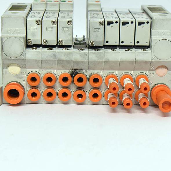 SMC Pneumatics (3) VQ1301-5 (1) VQ1101-5 Assembly w/Base Manifold & Blank Plates SMC Pneumatics (3) VQ1301-5 (1) VQ1101-5 Assembly w/Base Manifold & Blank Plates