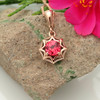 Rose Gold Pendant Necklace with Orange-Pink Sapphire in an adventurous webbed star design