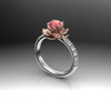 Lotus flower engagement ring with peach sapphire center