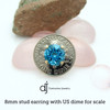 8mm stud earring with US dime for scale