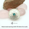 Dainty stud earrings with US dime for scale, 4mm