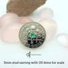 Tiny stud earrings with US dime for scale, 3mm
