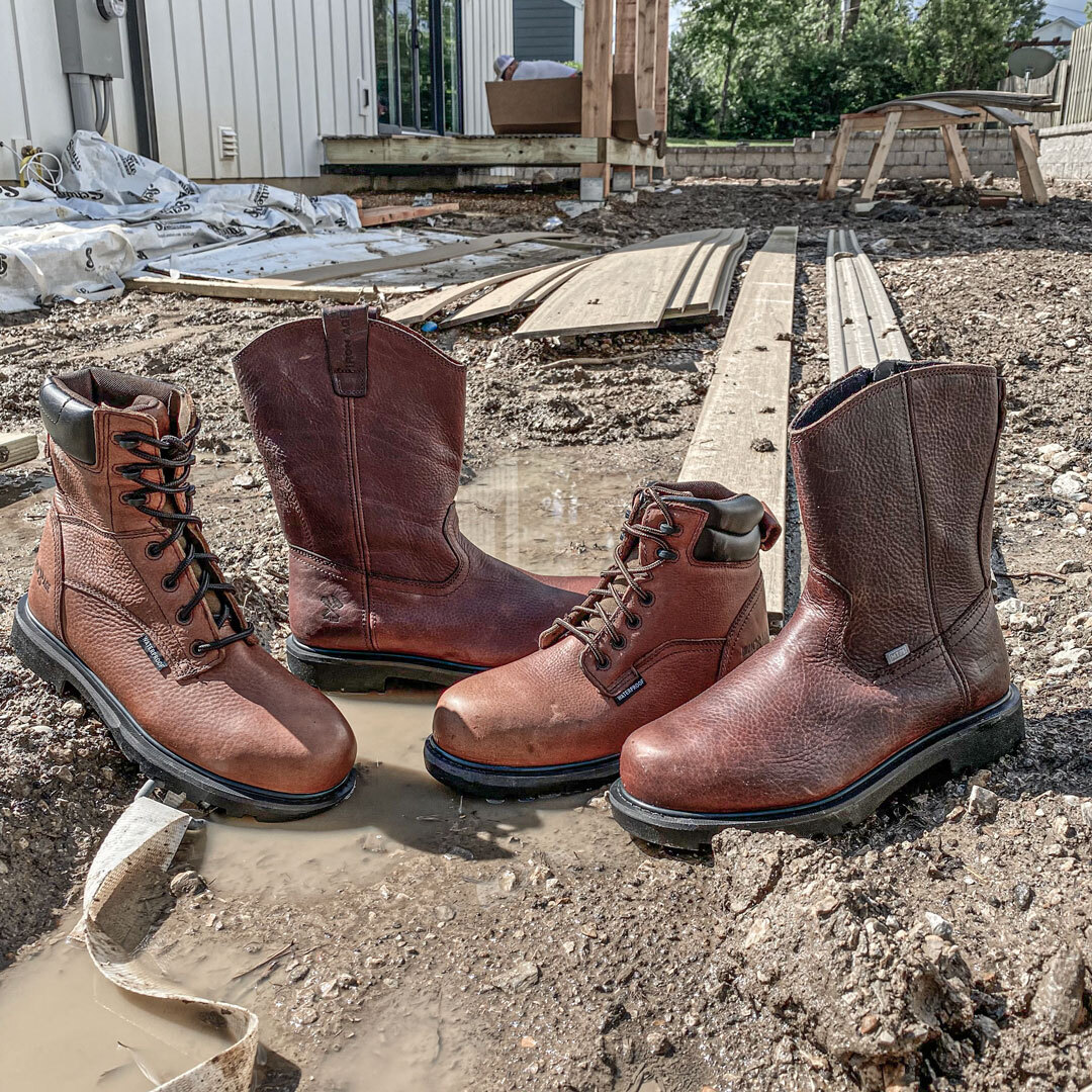 hauler-series-ia0160-ia0180-ia0194-ia019-mud-wet-instagram-facebook2.jpg Iron Age work boots sitting in a puddle on a muddy job site