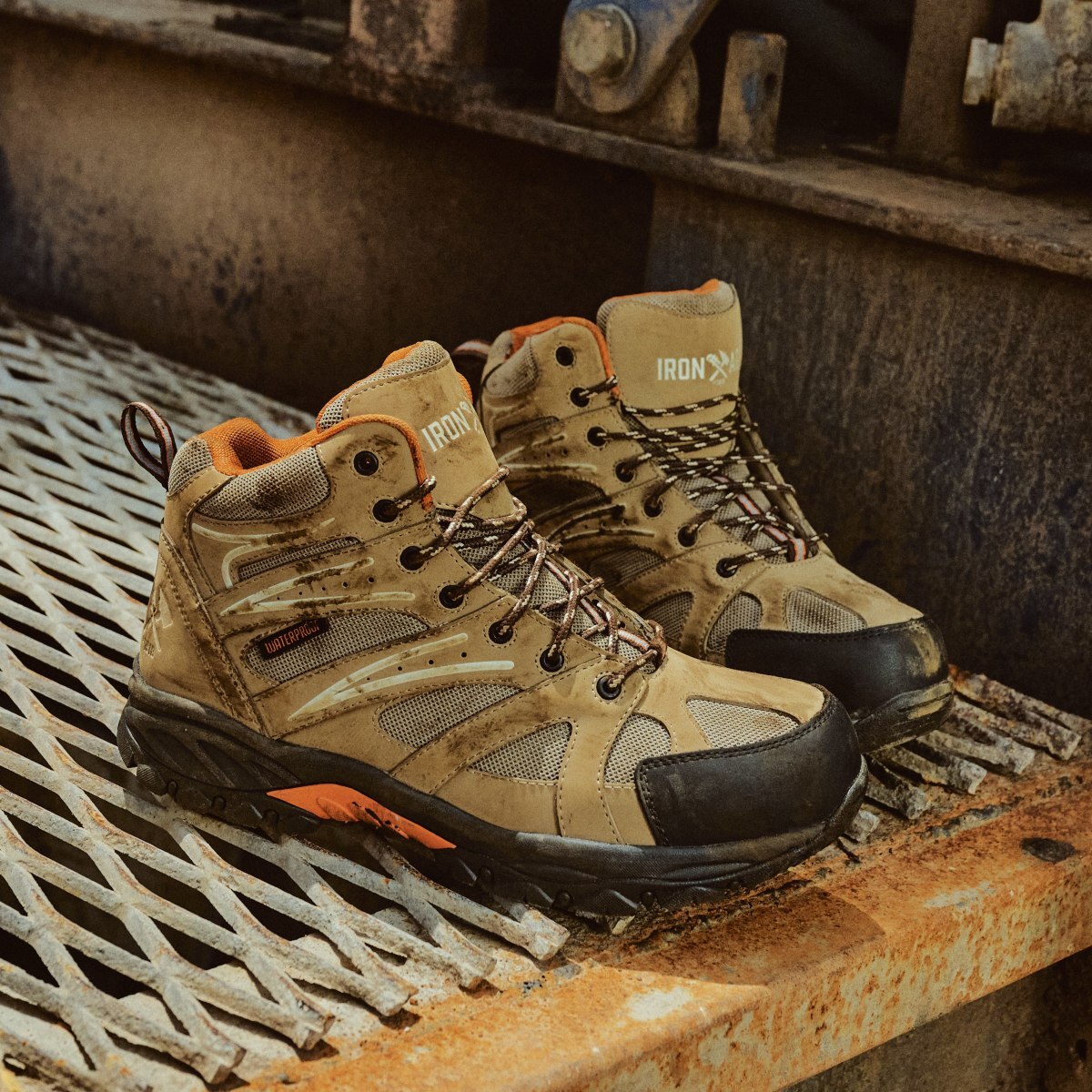 Iron Age Utility Work Boots A pair of rugged Iron Age utility work boots on a jobsite.