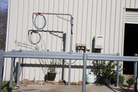 This Wall Mount Hose Boom is supplemented by a Thermann 26 instantaneous gas hot water unit.   Gas supplied from a 9kg bottle for year round hot water supply.