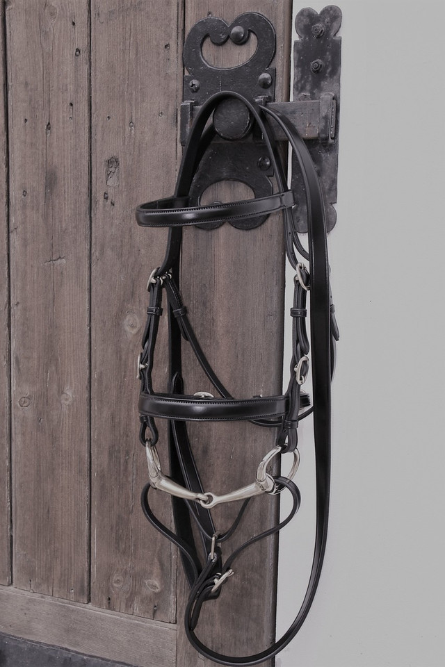 Black Leather Colour Featured with Brass Eggbut bit. (Bit not included)