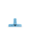 A light blue plastic bag clip.