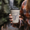An Oat Fressko cup, engraved with the Villino Hummingbird design