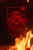 A black Deep Dark Winter hoodie, with flames in the foreground.