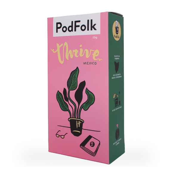 A slim box of coffee pods on a white background. The pink and green box read 'PodFolk', and features an illustration of a plant growing out of a coffee pod.