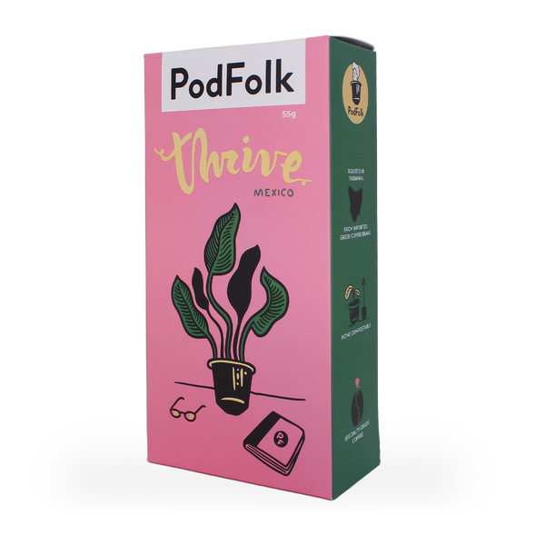 A slim box of coffee pods on a white background. The pink and green box read 'PodFolk', and features an illustration of a plant growing out of a coffee pod.