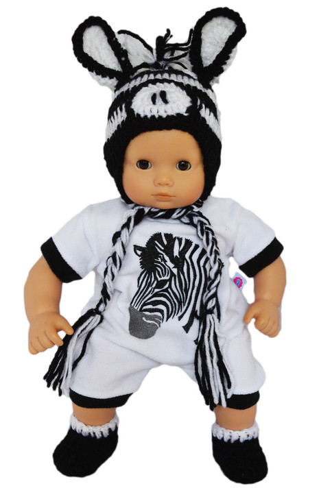 Baby doll wearing a zebra-themed knit hat, white romper with zebra print, matching booties, and pacifier – fits 15 to 17 inch dolls