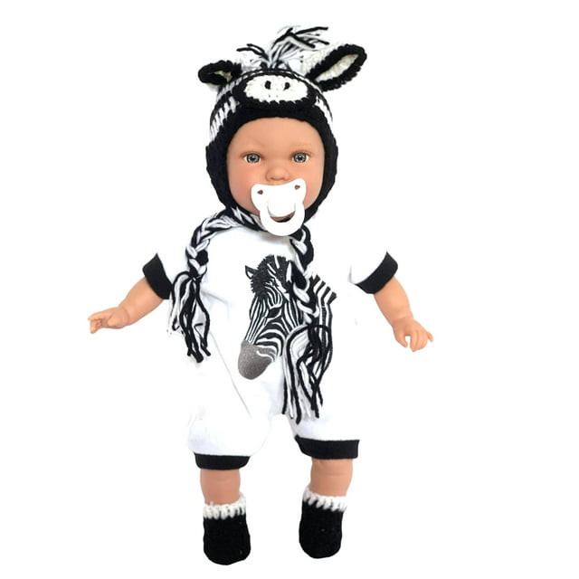 Baby doll wearing a zebra-themed knit hat, white romper with zebra print, matching booties, and pacifier – fits 15 to 17 inch dolls