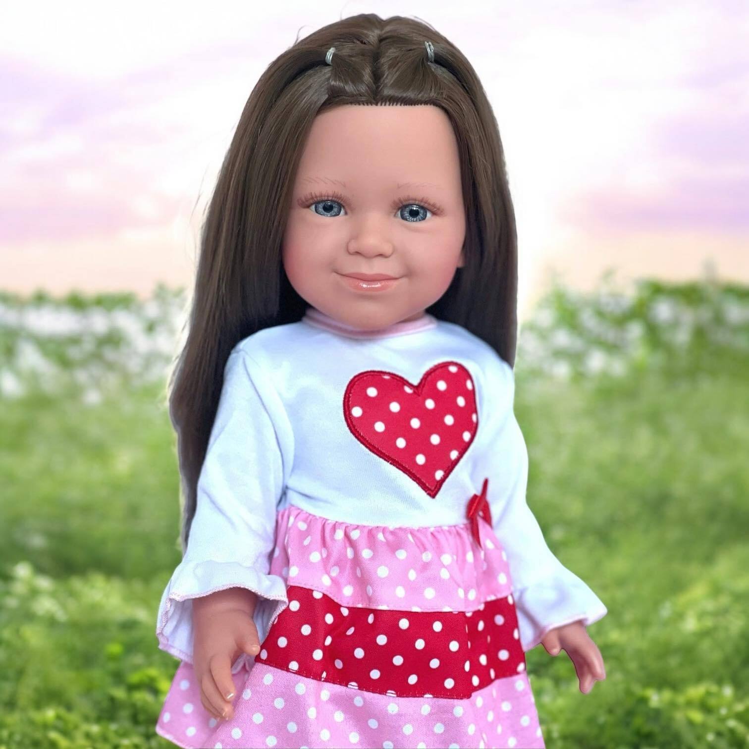 18-inch doll wearing My Brittany’s™ Valentine outfit with red heart top, pink and red polka dot ruffles, red leggings, and animal-face shoes. Fits Kennedy and Friends™ dolls.