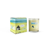 Wholesale, coastal illustrated box/label 20cl clear glass votive candle made with natural, soy, vegan wax. Aroma: Driftwood & Sea Sage. Illustration: Beach shack & Pebbles.