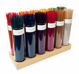 A Heaven Scent incense display, featuring 12 glass tubes designed to hold 100 incense sticks each, on a single bamboo stand.