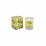 A Heaven Scent 9cl scented votive candle in a clear glass jar alongside its matching illustrated gift box. Both the candle label and the box feature. Aroma: Fern; Illustration: Mossy Dell, Dandelion & Hare