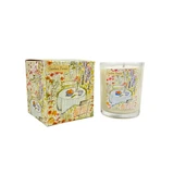 A Heaven Scent 20cl scented candle in a clear glass jar alongside its matching illustrated gift box. Aroma: Lime, Basil & Mandarin; Illustration: Garden Picnic