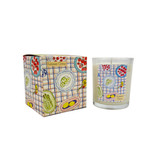A Heaven Scent 20cl scented candle in a clear glass jar alongside its matching illustrated gift box. Aroma: Limeleaf & Ginger; Illustration: Summer Citrus