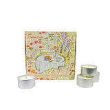 Heaven Scent tealights 20cl alongside an illustrated gift box which holds 9 scented tealights. Aroma: Lime, Basil & Mandarin; Illustration: Garden Picnic