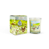 A Heaven Scent 9cl scented votive candle in a clear glass jar alongside its matching illustrated gift box. Both the candle label and the box feature. Aroma: Lime, Basil & Mandarin; Illustration: Chickens & Shed