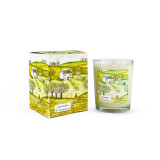 A Heaven Scent 9cl scented votive candle in a clear glass jar alongside its matching illustrated gift box. Both the candle label and the box feature. Aroma: Lavender & Geranium; Illustration: Girl & Dog.
