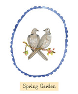 A Heaven Scent new SUMMER 20cl scented candle in a clear glass jar alongside its matching illustrated gift box. Aroma: Spring Garden; Illustration: Two Turtle Doves