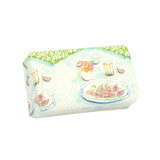 A Heaven Scent new spring/summer 150g natural soap bar, wrapped in an illustrative recyclable paper. Aroma: Sweet Figs,  Illustration: A plate of  figs and other food on a picnic rug