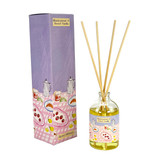 A Heaven Scent new SUMMER 100ml Reed Diffuser in a clear glass apothecary bottle with 10 natural reed sticks alongside its matching illustrated gift box. Aroma: Black Currant & Sweet Vanilla; Illustration: Coffee Pot, Croissant & Lemons