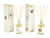 A Heaven Scent new SUMMER 100ml Reed Diffuser in a clear glass apothecary bottle with 10 natural reed sticks alongside its matching illustrated gift box.